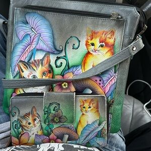 Used good condition anuschka purse with wallet